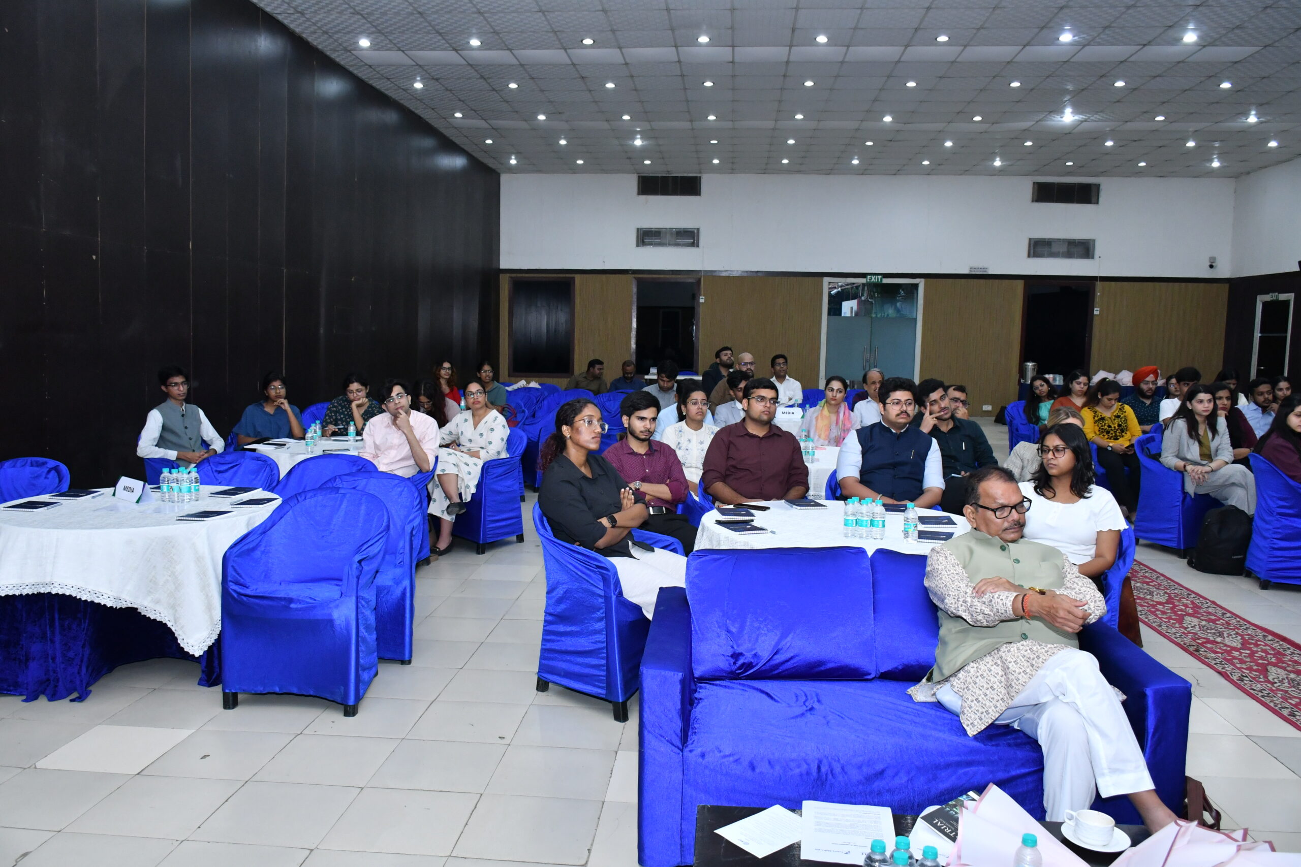 People presenting at a conference.